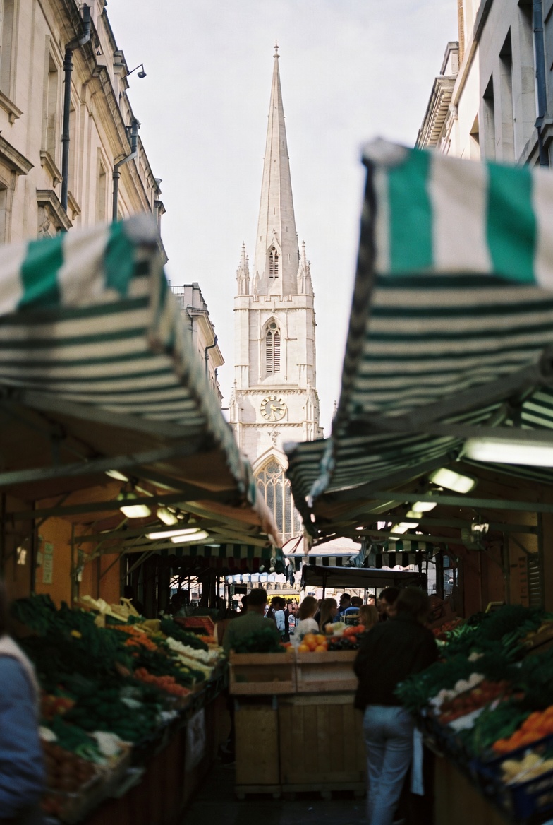 Southwark Cathedral seen from Borough Market on a bright morning.